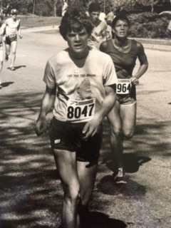 David Hicks running in a 5K, sponsored by the Columbia Tribune, around 1980.