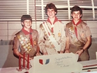 David Hicks, middle, receiving his Eagle Scout Badge.